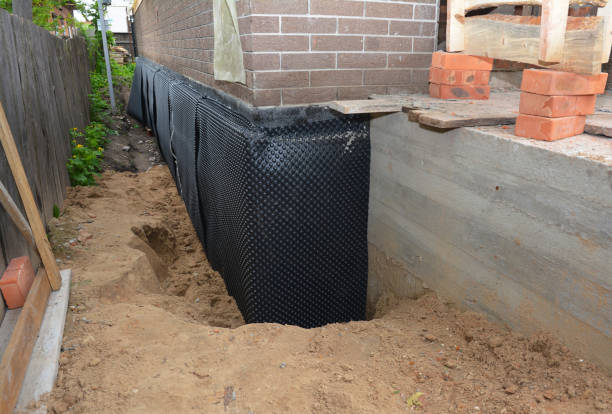 SJ Waterproofing Pros technician performing targeted Waterproofing assessment in Pike, NY